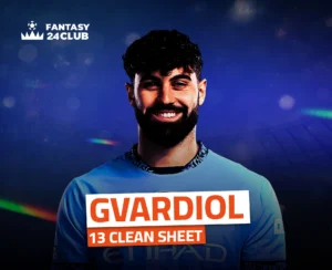 صورة مقربة للاعب كرة قدم، يبتسم للكاميرا، يرتدي قميصًا أزرق فاتحًا. اسمه "GVARDIOL" مكتوب بخط كبير في المقدمة مع "13 CLEAN SHEET" أسفله