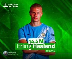 صورة للاعب كرة القدم إيرلينج هالاند بقميص مانشستر سيتي، معروضة في سياق لعبة Fantasy. السعر المذكور هو 14.4 مليون، ومركزه هو مهاجم (Forward)
